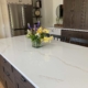Closeup of quartz countertop in kitchen.